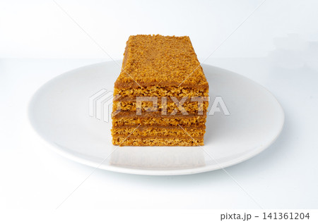 Honey cake isolated, medovik dessert piece 141361204