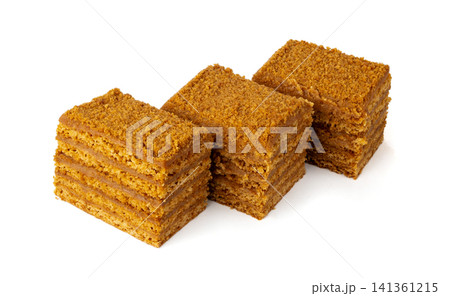 Honey cake isolated, medovik dessert piece Honey cake isolated, medovik dessert piece 141361215