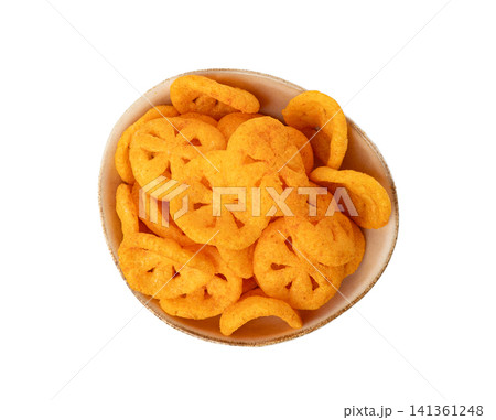 Corn puff snack isolated, crunchy cereal nosh, crispy yellow rice breakfast with paprika Corn puff snack isolated, crunchy cereal nosh, crispy yellow rice breakfast with paprika 141361248