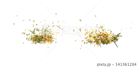 Dried vegetable mix isolated. Dehydrated greens, onion, carrot pieces, seasoning chips, flakes Dried vegetable mix isolated. Dehydrated greens, onion, carrot pieces, seasoning chips, flakes 141361284