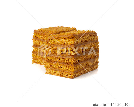 Honey cake isolated, medovik dessert piece Honey cake isolated, medovik dessert piece 141361302