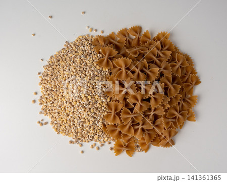 Raw Brown Farfalle Pasta Isolated Raw Brown Farfalle Pasta Isolated 141361365
