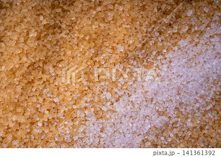 Brown cane sugar pile textured background top view 141361392
