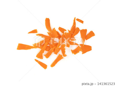 Finely chopped pieces of fresh carrots isolated Finely chopped pieces of fresh carrots isolated 141361523