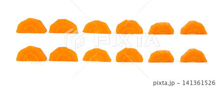 Round carrot semicircles isolated. Sweet orange vegetable circles halves Round carrot semicircles isolated. Sweet orange vegetable circles halves 141361526