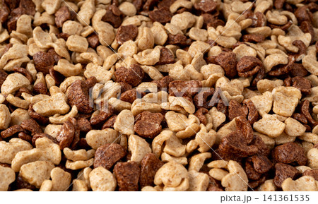 Chocolate cereal flakes textured background closeup 141361535