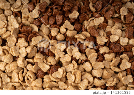 Chocolate cereal flakes texture background, rice crispy breakfast pattern Chocolate cereal flakes texture background, rice crispy breakfast pattern 141361553