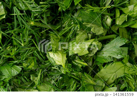 Fresh chopped herbs textured background 141361559