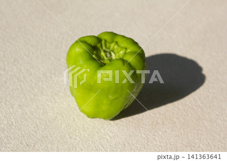 It is a close-up of a green bell pepper. It is a close-up of a green bell pepper. 141363641