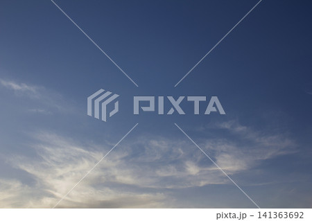It is a sky with feathery clouds. It is a sky with feathery clouds. 141363692