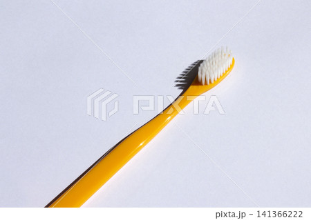 It is a colorful toothbrush. 141366222