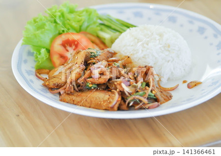 stir fried pork or spicy pork and rice or pork and rice 141366461