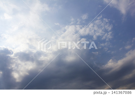 It is a cloudy late afternoon sky. It is a cloudy late afternoon sky. 141367086