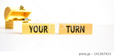 Your turn words symbol. Concept words Your turn on beautiful wooden blocks. Beautiful white background. Wooden chest with coins. Business your turn motivational support concept. Copy space. Your turn words symbol. Concept words Your turn on beautiful wooden blocks. Beautiful white background. Wooden chest with coins. Business your turn motivational support concept. Copy space. 141367423