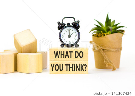 What do you think symbol. Concept words What do you think on beautiful wooden blocks. Beautiful white background. Black alarm clock. Business What do you think motivational support concept. Copy space What do you think symbol. Concept words What do you think on beautiful wooden blocks. Beautiful white background. Black alarm clock. Business What do you think motivational support concept. Copy space 141367424