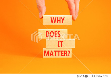 Why does it matter words symbol. Concept words Why does it matter on beautiful wooden blocks. Beautiful orange background. Businessman hand. Business support why does it matter concept. Copy space. Why does it matter words symbol. Concept words Why does it matter on beautiful wooden blocks. Beautiful orange background. Businessman hand. Business support why does it matter concept. Copy space. 141367660