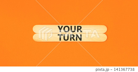 Your turn words symbol. Concept words Your turn on beautiful wooden sticks. Beautiful orange background. Business your turn motivational support concept. Copy space. Your turn words symbol. Concept words Your turn on beautiful wooden sticks. Beautiful orange background. Business your turn motivational support concept. Copy space. 141367738