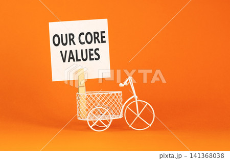 Our core values words symbol. Concept words Our core values on beautiful white paper on wooden clothespin. Beautiful orange background. Business our core values motivational support concept Copy space 141368038