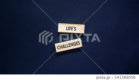 Life's challenges words symbol. Concept words Life's challenges on beautiful wooden blocks. Beautiful black background. Business lifestyle and Life's challenges words concept. Copy space. Life's challenges words symbol. Concept words Life's challenges on beautiful wooden blocks. Beautiful black background. Business lifestyle and Life's challenges words concept. Copy space. 141368056