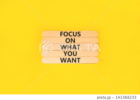 Focus on what you want symbol. Concept words Focus on what you want on beautiful wooden sticks. Beautiful yellow background. Psychological and focus on what you want concept. Copy space. Focus on what you want symbol. Concept words Focus on what you want on beautiful wooden sticks. Beautiful yellow background. Psychological and focus on what you want concept. Copy space. 141368233