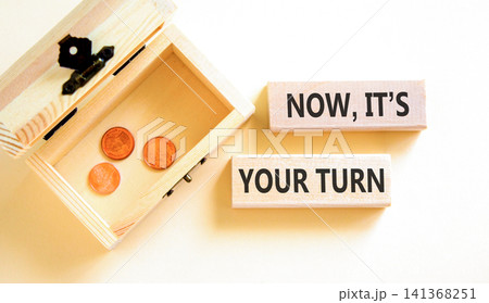 Now it's your turn symbol. Concept words Now it's your turn on beautiful wooden blocks. Beautiful white background. Wooden chest. Business Now it's your turn motivational support concept. Copy space. Now it's your turn symbol. Concept words Now it's your turn on beautiful wooden blocks. Beautiful white background. Wooden chest. Business Now it's your turn motivational support concept. Copy space. 141368251