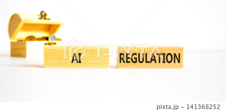 AI regulation symbol. Concept words AI artificial intelligence regulation on beautiful wooden blocks. Beautiful white background. Business AI artificial intelligence regulation concept. Copy space. AI regulation symbol. Concept words AI artificial intelligence regulation on beautiful wooden blocks. Beautiful white background. Business AI artificial intelligence regulation concept. Copy space. 141368252