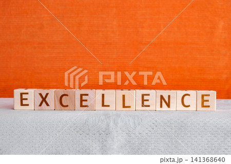 motivational word Excellence made of letters on wooden cubes motivational word Excellence made of letters on wooden cubes 141368640