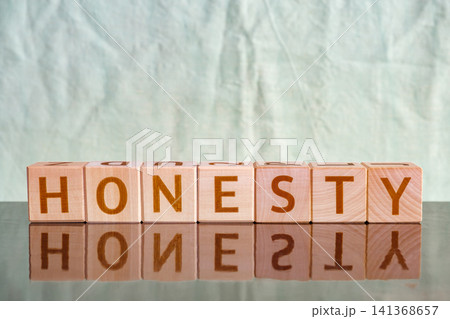 motivational word Honesty made of letters on wooden cubes motivational word Honesty made of letters on wooden cubes 141368657