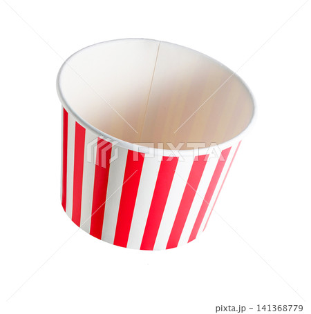 Red and white striped paper bucket stands alone 141368779