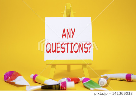Any Questions symbol. Wooden blocks with words Any Questions . Beautiful yellow background with paints and easel. Business and Any Questions concept. Copy space. Any Questions symbol. Wooden blocks with words Any Questions . Beautiful yellow background with paints and easel. Business and Any Questions concept. Copy space. 141369038
