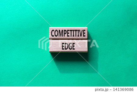 Competitive edge symbol. Concept word Competitive edge on wooden blocks. Beautiful green background. Business and Competitive edge concept. Copy space 141369086