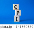 CPI - Consumer Price Index symbol. Concept word CPI on wooden cubes. Beautiful blue background. Business and CPI concept. Copy space. 141369389
