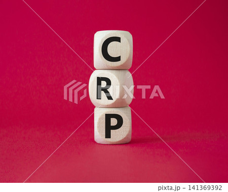CRP - C-Reactive Protein Test symbol. Wooden cubes with word CRP. Beautiful red background. Medical and C-Reactive Protein Test concept. Copy space. CRP - C-Reactive Protein Test symbol. Wooden cubes with word CRP. Beautiful red background. Medical and C-Reactive Protein Test concept. Copy space. 141369392