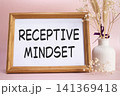 Receptive Mindset symbol. Concept words Receptive Mindset on beautiful wooden picture frame. Beautiful pink background with flower vase. Business and Receptive Mindset concept. Copy space. 141369418