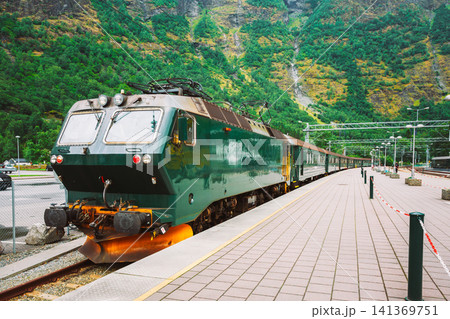 The famous green Flam Railway train waiting at the station platform. The famous green Flam Railway train waiting at the station platform. 141369751