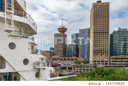 View of Vancouver city Skyline with Cruise ship port at Vancouver Harbour Canada on a summer day. Travel photo-July 10,2022 View of Vancouver city Skyline with Cruise ship port at Vancouver Harbour Canada on a summer day. Travel photo-July 10,2022 141370930