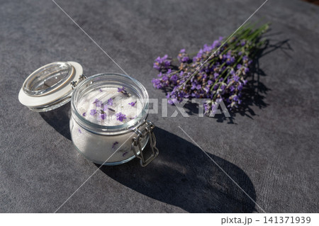Homemade lavender sugar in glass jar with fresh lavender bouquet Homemade lavender sugar in glass jar with fresh lavender bouquet 141371939