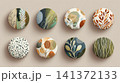 A set of eight circular badges featuring watercolor floral ornaments, leaves, and organic shapes 141372133