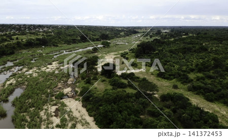 Drone Captures Natural Scenic Landscape. Wideangle Aerial Image Displaying River Bend Among Vibrant Foliage . Media 141372453