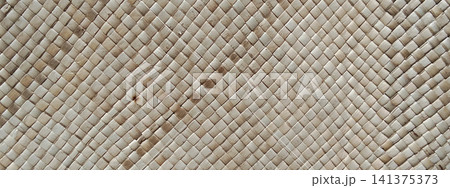 Natural woven palm leaf texture background Natural woven palm leaf texture background 141375373