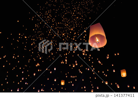 Enchanting Sky Lanterns at Yi-Peng Festival, Chiang Mai Thailand. Enchanting Sky Lanterns at Yi-Peng Festival, Chiang Mai Thailand. 141377411