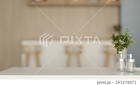 Close-up of modern kitchen counter with soap dispensers. Close-up of modern kitchen counter with soap dispensers. 141378071