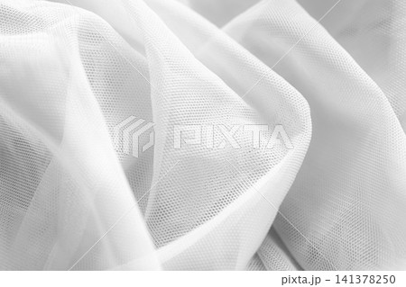 Background fabric white cloth cotton sheet silk material texture satin pattern fashion abstract shape space mockup beautiful textile luxury ripples wallpaper smooth vintage canvas elegance wall. Background fabric white cloth cotton sheet silk material texture satin pattern fashion abstract shape space mockup beautiful textile luxury ripples wallpaper smooth vintage canvas elegance wall. 141378250