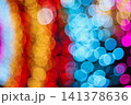 Beautiful colorful bokeh lights background texture with blur effect. Lots of round circles shiny red blue and gold colors for wallpaper decoration 141378636