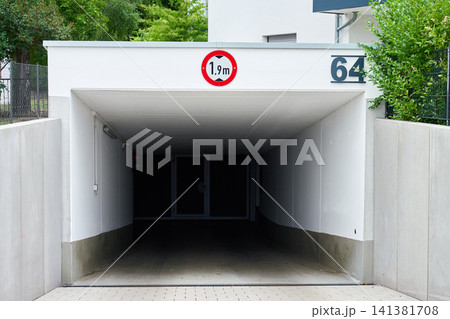 Underground Parking Entrance at Modern Apartment Building Underground Parking Entrance at Modern Apartment Building 141381708