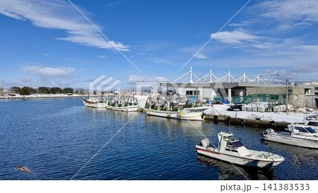 Panoramic fishing harbor with boats and snowy mountains Panoramic fishing harbor with boats and snowy mountains 141383533