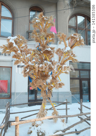Snow-covered Didukh art with ribbons in Lviv Snow-covered Didukh art with ribbons in Lviv 141385386