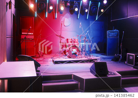 Dynamic red and blue lights on an empty concert stage Dynamic red and blue lights on an empty concert stage 141385462