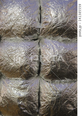 Silver crinkled material texture with distinct segments Silver crinkled material texture with distinct segments 141385559
