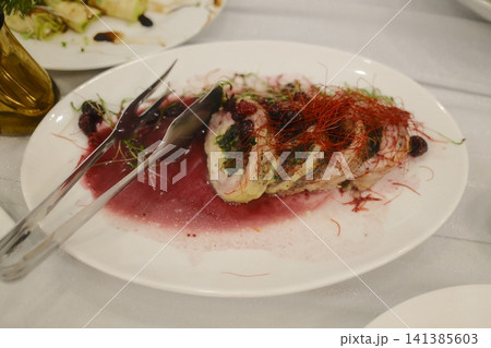 Stuffed chicken with berries and red threads at a buffet Stuffed chicken with berries and red threads at a buffet 141385603